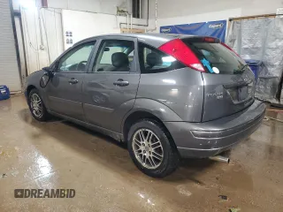 2005 Ford Focus S with VIN 3FAFP37N05R120564, listed as a Copart auction lot 49404935 with 102,254 mi miles and Salvage Title. Bid and sale history available at carsss.com. Image 2.