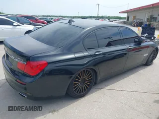 2011 BMW 7 Series 750Li with VIN WBAKB8C55BC852304, listed as a IAAI auction lot 42017467 with 116,530 mi miles. Bid and sale history available at carsss.com. Image 4.