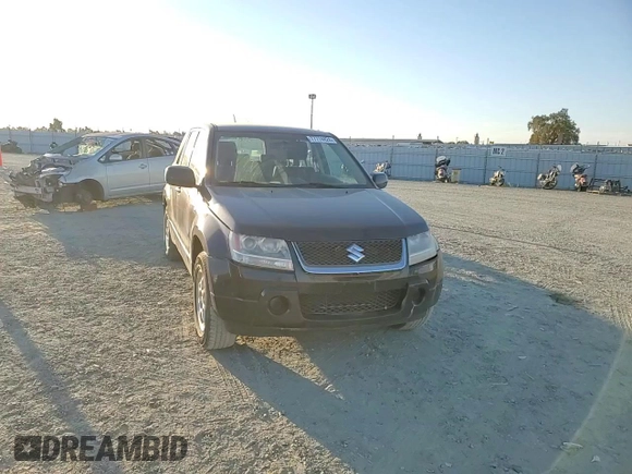 2007 Suzuki Grand Vitara with VIN JS3TE941474202110, listed as a Copart auction lot 77774424 with 131,717 mi miles and Salvage title. Bid and sale history available at DreamBid. Image 12.