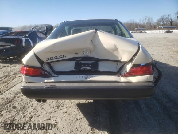 1988 Mercedes-Benz 300 with VIN WDBEA50D9JA698251, listed as a Copart auction lot 46977055 with 107,949 mi miles and Salvage Title. Bid and sale history available at DreamBid. Image 6.