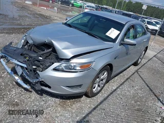 2012 Ford Taurus SEL z VIN 1FAHP2EW4CG137421, wystawiony jako IAAI lot #41915724 z przebiegiem 129 869 mil mil oraz . Historia ofert i sprzedaży dostępna na DreamBid. Obrazek 2.