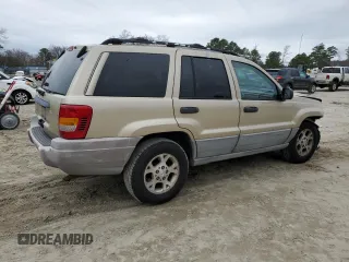 1999 Jeep Grand Cherokee Laredo с VIN 1J4G258S5XC795691, выставлен на аукционе Copart как лот 42556215 с пробегом 320 188 миль миль и Списание • Salvage title. История ставок и продаж доступна на DreamBid. Изображение 3.