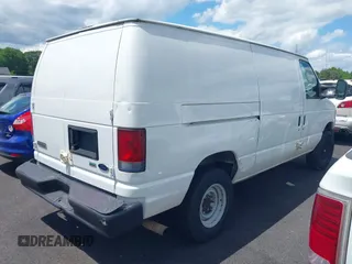 2010 Ford Econoline Cargo Commercial with VIN 1FTNE2EL3ADA76618, listed as a IAAI auction lot 42181759 with 240,124 mi miles and . Bid and sale history available at DreamBid. Image 4.