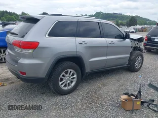 2018 Jeep Grand Cherokee Laredo E with VIN 1C4RJFAG4JC475993, listed as a IAAI auction lot 42295008 with 106,024 mi miles and . Bid and sale history available at DreamBid. Image 4.