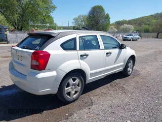 2007 Dodge Caliber SXT with VIN 1B3HB48BX7D160420, listed as a IAAI auction lot 42133771 with 169,796 mi miles and . Bid and sale history available at carsss.com. Image 4.