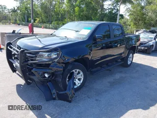 2021 Chevrolet Colorado 2WD LT z VIN 1GCGSCEN1M1131727, wystawiony jako IAAI lot #42181484 z przebiegiem 54 764 mil mil oraz . Historia ofert i sprzedaży dostępna na DreamBid. Obrazek 2.