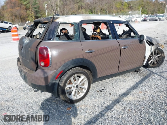 2013 MINI Cooper Countryman with VIN WMWZB3C59DWM31642, listed as a IAAI auction lot 40794983 with 1 mi miles. Bid and sale history available at carsss.com. Image 4.