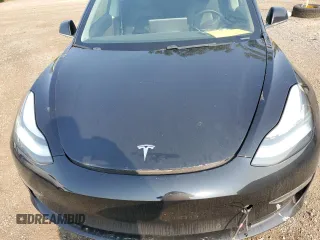 2020 Tesla Model 3 Standard Range Plus with VIN 5YJ3E1EA8LF609364, listed as a Copart auction lot 58828794 with 127,781 mi miles and Non Repairable. Bid and sale history available at DreamBid. Image 11.
