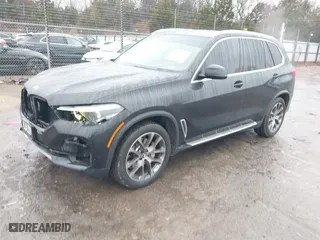 2023 BMW X5 xDrive40i with VIN 5UXCR6C03P9P62891, listed as a IAAI auction lot 41492392 with 51,471 mi miles. Bid and sale history available at carsss.com. Image 2.