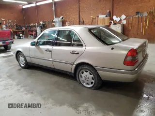 1995 Mercedes-Benz C with VIN WDBHA28E8SF115598, listed as a Copart auction lot 50145195 with 129,134 mi miles and Clean Title. Bid and sale history available at carsss.com. Image 2.