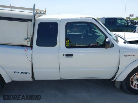 2002 Ford Ranger XL with VIN 1FTYR14U82PA53776, listed as a IAAI auction lot 41968782 with Not Provided miles and . Bid and sale history available at carsss.com. Image 13.