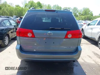 2009 Toyota Sienna XLE with VIN 5TDZK22C99S239755, listed as a IAAI auction lot 42096411 with 214,983 mi miles. Bid and sale history available at carsss.com. Image 17.