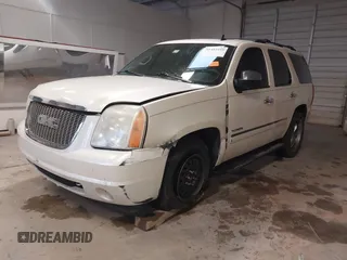 2009 GMC Yukon SLT w/4SB with VIN 1GKFC33069R299683, listed as a IAAI auction lot 41453259 with 182,415 mi miles. Bid and sale history available at carsss.com. Image 2.