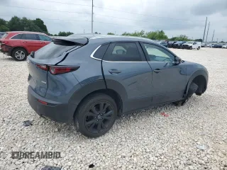 2023 Mazda CX-30 S Carbon Edition z VIN 3MVDMBCM2PM539130, wystawiony jako Copart lot #54817735 z przebiegiem 29 678 mil mil oraz Szkoda całkowita • Salvage title. Historia ofert i sprzedaży dostępna na DreamBid. Obrazek 3.