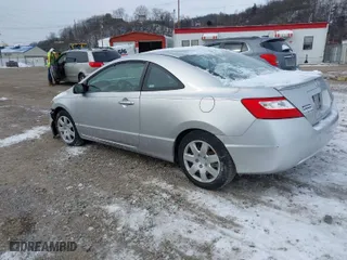 2007 Honda Civic Cpe LX with VIN 2HGFG12627H505932, listed as a IAAI auction lot 41609140 with 188,438 mi miles. Bid and sale history available at carsss.com. Image 3.