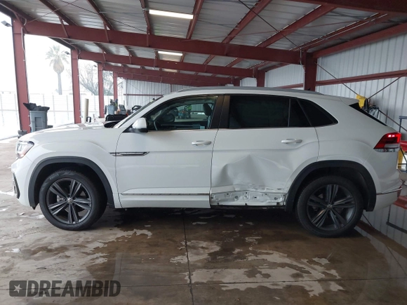 2021 Volkswagen Atlas SE z VIN 1V2NE2CA4MC201281, wystawiony jako IAAI lot #41242760 z przebiegiem 95 209 mil mil oraz . Historia ofert i sprzedaży dostępna na DreamBid. Obrazek 15.