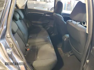 2020 Honda Fit LX z VIN 3HGGK5H46LM710780, wystawiony jako Copart lot #53032525 z przebiegiem 102 541 mil mil oraz Szkoda całkowita • Salvage title. Historia ofert i sprzedaży dostępna na DreamBid. Obrazek 11.