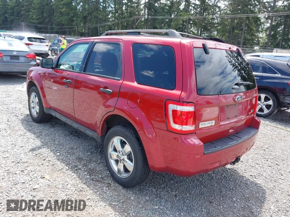 2012 Ford Escape XLT with VIN 1FMCU9DG9CKC46370, listed as a IAAI auction lot 42527937 with 152,031 mi miles and . Bid and sale history available at DreamBid. Image 3.