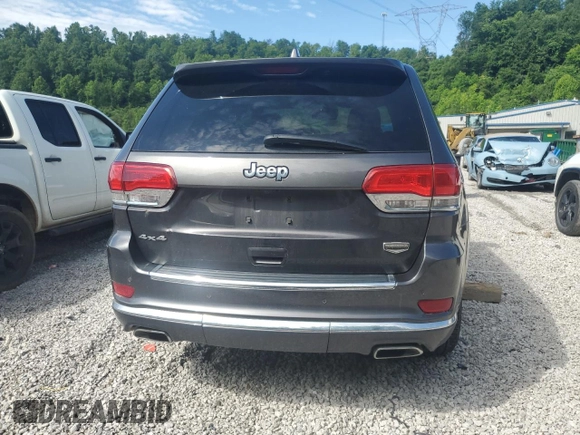 2014 Jeep Grand Cherokee Summit with VIN 1C4RJFJT4EC346946, listed as a Copart auction lot 60613025 with 50,565 mi miles and Salvage title. Bid and sale history available at DreamBid. Image 6.