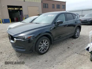 2021 Mazda CX-5 Grand Touring with VIN JM3KFBDM6M0401517, listed as a Copart auction lot 51019645 with 55,906 mi miles and Salvage Title. Bid and sale history available at DreamBid. Image 1.