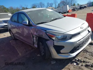 2021 Kia Rio S with VIN 3KPA24AD4ME363969, listed as a IAAI auction lot 41304242 with 119,194 mi miles and . Bid and sale history available at DreamBid. Image 1.
