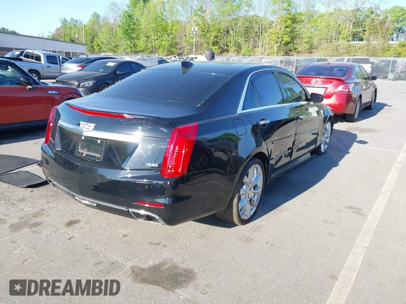 2015 Cadillac CTS Premium AWD with VIN 1G6AZ5S35F0129572, listed as a IAAI auction lot 42045670 with 62,758 mi miles and . Bid and sale history available at DreamBid. Image 4.