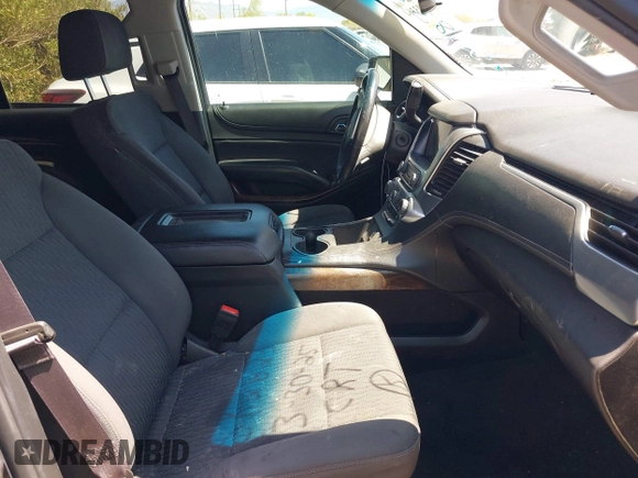 2017 Chevrolet Tahoe LS with VIN 1GNSCAKC3HR328833, listed as a IAAI auction lot 41993364 with 124,817 mi miles and . Bid and sale history available at DreamBid. Image 5.