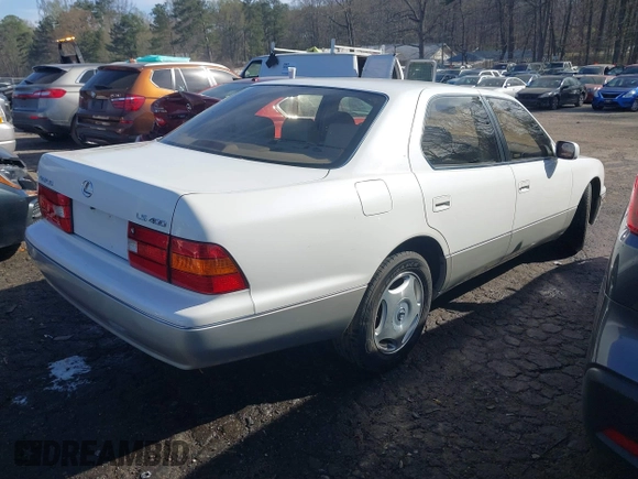 2000 Lexus LS 400 with VIN JT8BH28F7Y0168492, listed as a IAAI auction lot 41810357 with 92,472 mi miles and . Bid and sale history available at carsss.com. Image 4.