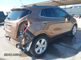 2016 Buick Encore Leather with VIN KL4CJCSB6GB656528, listed as a IAAI auction lot 42083024 with 72,582 mi miles. Bid and sale history available at carsss.com. Image 4.