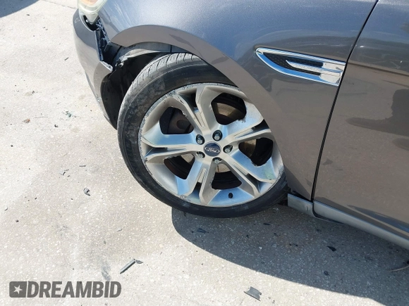 2011 Ford Taurus SHO with VIN 1FAHP2KT6BG167447, listed as a IAAI auction lot 41433934 with 201,600 mi miles and . Bid and sale history available at DreamBid. Image 6.