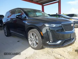 2023 Cadillac XT6 AWD Premium Luxury with VIN 1GYKPDRSXPZ189689, listed as a IAAI auction lot 42447212 with 45,413 mi miles and . Bid and sale history available at DreamBid. Image 1.