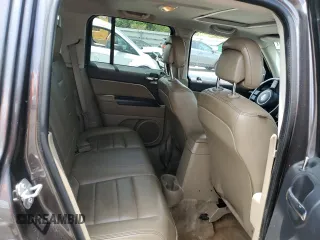 2014 Jeep Patriot High Altitude with VIN 1C4NJPFA2ED888925, listed as a Copart auction lot 60191435 with 122,308 mi miles and Salvage title. Bid and sale history available at DreamBid. Image 11.