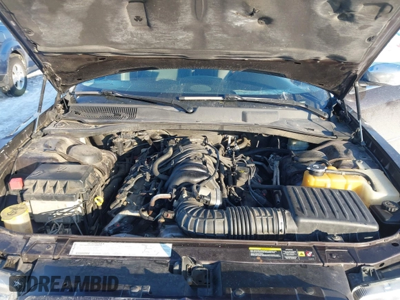 2005 Chrysler 300 with VIN 2C3AA63H65H526016, listed as a IAAI auction lot 41296420 with 136,794 mi miles. Bid and sale history available at carsss.com. Image 10.