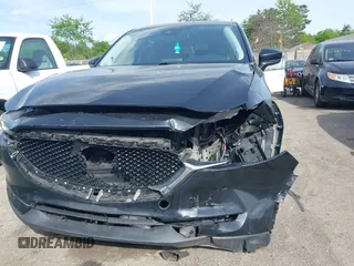 2018 Mazda CX-5 Touring z VIN JM3KFBCM9J0358997, wystawiony jako IAAI lot #42332606 z przebiegiem 93 952 mil mil oraz . Historia ofert i sprzedaży dostępna na DreamBid. Obrazek 17.