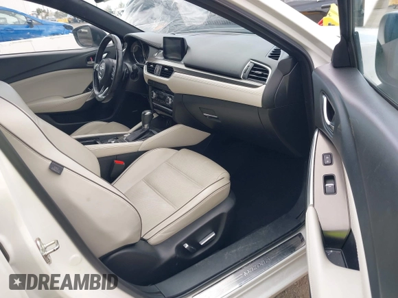 2017 Mazda 6 Grand Touring with VIN JM1GL1X57H1118646, listed as a IAAI auction lot 41896459 with 105,768 mi miles and . Bid and sale history available at carsss.com. Image 5.