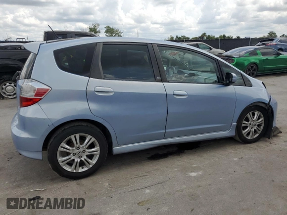 2010 Honda Fit Sport with VIN JHMGE8H64AC032634, listed as a Copart auction lot 61795825 with 143,593 mi miles and Salvage title. Bid and sale history available at DreamBid. Image 3.