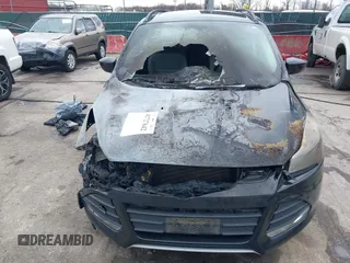 2014 Ford Escape SE with VIN 1FMCU0GXXEUA88622, listed as a IAAI auction lot 41727642 with 22,358 mi miles and . Bid and sale history available at DreamBid. Image 6.