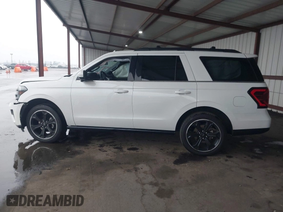 2023 Ford Expedition Limited with VIN 1FMJU2A89PEA47772, listed as a IAAI auction lot 41242800 with 14,512 mi miles. Bid and sale history available at carsss.com. Image 14.