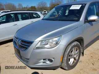 2011 Volkswagen Tiguan SE with VIN WVGBV7AX5BW549090, listed as a IAAI auction lot 41550983 with 153,739 mi miles and . Bid and sale history available at DreamBid. Image 6.