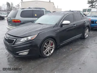 2013 Kia Optima SX w/Limited Pkg with VIN 5XXGR4A68DG189452, listed as a IAAI auction lot 41563636 with 131,241 mi miles. Bid and sale history available at carsss.com. Image 2.