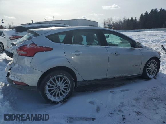 2016 Ford Focus Electric z VIN 1FADP3R42GL380784, wystawiony jako Copart lot #42308195 z przebiegiem 8167 mil mil oraz Szkody całkowita. Historia ofert i sprzedaży dostępna na DreamBid. Obrazek 3.