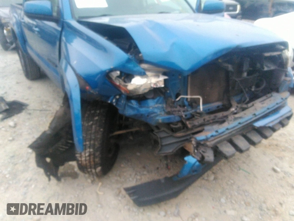 2018 Toyota Tacoma SR5 with VIN 3TMAZ5CN3JM066409, listed as a IAAI auction lot 41204775 with 75,000 mi miles and . Bid and sale history available at DreamBid. Image 6.