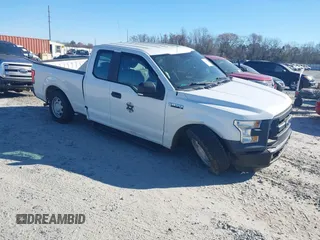 2015 Ford F-150 XL with VIN 1FTEX1C86FFB98582, listed as a IAAI auction lot 41678059 with 76,424 mi miles. Bid and sale history available at carsss.com. Image 1.