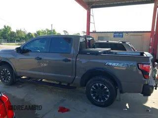 2021 Nissan Titan SV with VIN 1N6AA1ED1MN523973, listed as a IAAI auction lot 42406382 with 73,688 mi miles and . Bid and sale history available at DreamBid. Image 14.
