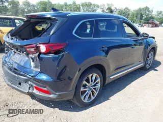 2019 Mazda CX-9 Grand Touring with VIN JM3TCBDY6K0335886, listed as a IAAI auction lot 42704250 with 37,171 mi miles and . Bid and sale history available at DreamBid. Image 4.