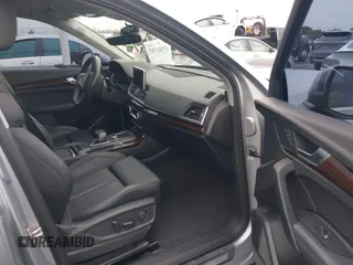 2019 Audi Q5 Premium Plus z VIN WA1BNAFY5K2084220, wystawiony jako IAAI lot #42391537 z przebiegiem 36 143 mil mil oraz . Historia ofert i sprzedaży dostępna na DreamBid. Obrazek 5.