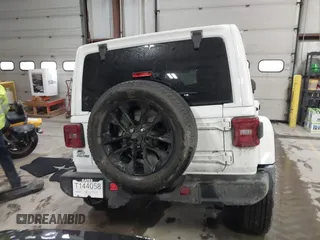 2021 Jeep Wrangler Unlimited Sahara with VIN 1C4JJXP60MW830307, listed as a IAAI auction lot 41869863 with 37,201 mi miles and . Bid and sale history available at DreamBid. Image 16.