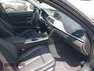 2014 BMW 3 Series 320i xDrive with VIN WBA3C3C57EP662795, listed as a IAAI auction lot 42267683 with 153,451 mi miles and . Bid and sale history available at DreamBid. Image 5.