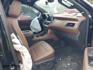 2021 Chevrolet Tahoe High Country with VIN 1GNSKTKL7MR330223, listed as a IAAI auction lot 40232561 with 66,743 mi miles. Bid and sale history available at carsss.com. Image 5.
