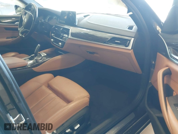 2018 BMW 5 Series 530i xDrive with VIN WBAJA7C55JWA73459, listed as a IAAI auction lot 41634921 with 64,759 mi miles and . Bid and sale history available at DreamBid. Image 5.